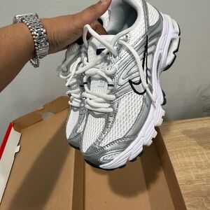 Nike Women's White and Silver Mesh Sneakers with Black Swoosh